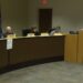 Kaplan addresses the Board of Commissioners.
