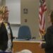New District 4 Commissioner Kelli Van Ginhoven takes her oath of office.
