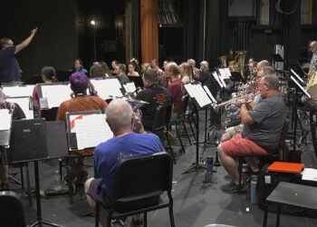 The City Band rehearses for its Centennial Celebration