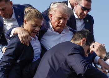 (Anna Moneymaker/Getty Images via CNN Newsource) 	Former President Donald Trump is rushed offstage by U.S. Secret Service agents after a shooting during his rally in Butler, Pennsylvania, on July 13.