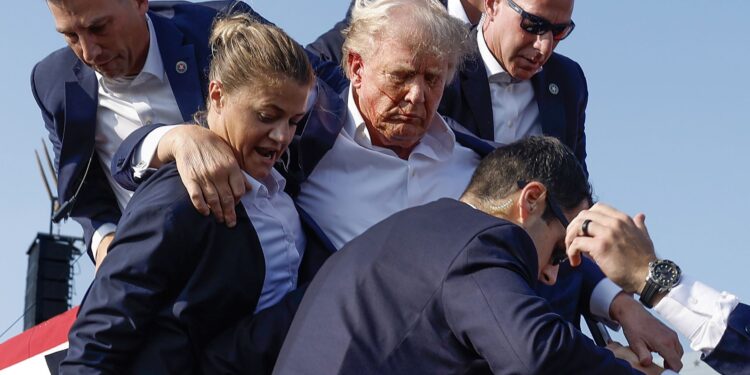 (Anna Moneymaker/Getty Images via CNN Newsource) 	Former President Donald Trump is rushed offstage by U.S. Secret Service agents after a shooting during his rally in Butler, Pennsylvania, on July 13.