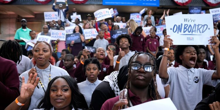 (Evan Vucci/AP via CNN Newsource) Supporters listen as President Joe Biden speaks during a campaign event at Girard College in Philadelphia on May 29.