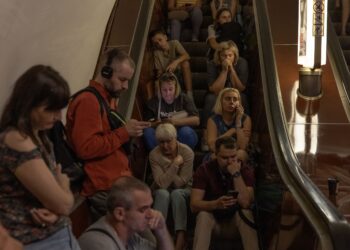 (Roman Pilipey/AFP/Getty Images via CNN Newsource) People take shelter in the Tealtralna metro station in Kyiv, Ukraine, August 26, 2024.