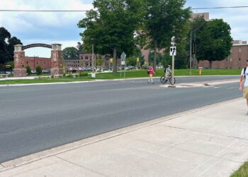 (MDOT photo) The four-lane boulevard section of Townsend Avenue in front of Michigan Technological University’s campus was converted to two lanes with designated turn lanes at major intersections. These changes have improved traffic flow and increased pedestrian safety.