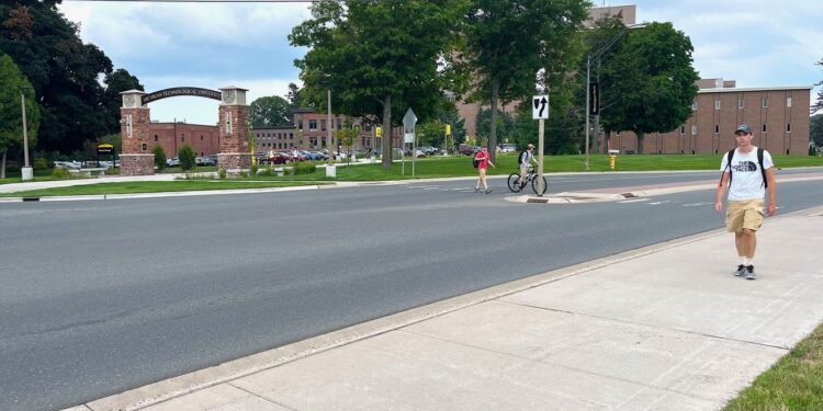 (MDOT photo) The four-lane boulevard section of Townsend Avenue in front of Michigan Technological University’s campus was converted to two lanes with designated turn lanes at major intersections. These changes have improved traffic flow and increased pedestrian safety.