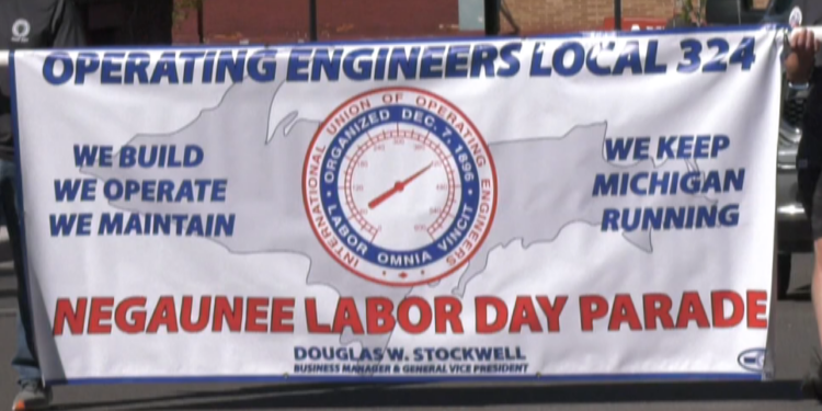 Union members march in Negaunee Labor Day Parade