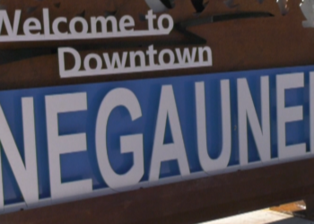 NEGAUNEE CITY OFFICIALS ANNOUNCED YESTERDAY THE COMPLETION OF THE STREETSCAPE PROJECT, AN AMBITIOUS 3.4 MILLION DOLLAR RENOVATION OF THEIR DOWNTOWN. BEGINNING WITH AN OVERHAUL OF THE SEWER AND WATER LINES, REPAVING OF THEIR MAIN THOROUGHFARES, NEW SIDEWALKS, AND IMPROVED LIGHTING.