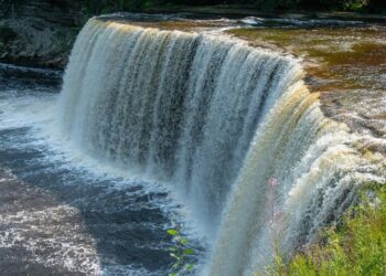 (Credit: Michigan Department of Natural Resources) The 200-feet-wide Upper Falls, located in Tahquamenon Falls State Park, is one the largest waterfalls east of the Mississippi River.