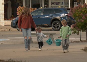 Shepard and his sister with their Teal Pumpkin buckets