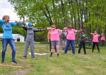 (Courtesy: Michigan DNR) A scene from the June 2017 summer session during the 20th anniversary year of the Michigan Department of Natural Resources' Upper Peninsula Becoming an Outdoors Woman program. This image shows students from a BOW archery class.