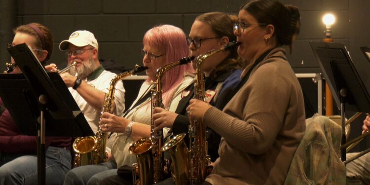 Members of the Escanaba City Band rehearse for next week's performance