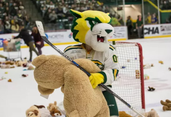 The Northern Michigan University Student Athletic Advisory Committee and The Mining Journal Cheer Club held a teddy bear toss during the NMU / Ferris State Hockey game this evening. Spectators were asked to bring in a stuffed animal to donate to less fortunate children this holiday season. a cascade of toys was tossed onto the ice where they were collected, sorted, and donated to St.Vincent DePaul and the Salvation Army for distribution to area boys and girls. Salvation Army board member Jim Reevs says these donated teddy bears might be some child's only gift this Christmas.