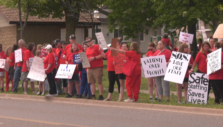 They lined the roadway along Washington Street in Downtown Marquette. Nurses and health care workers rallied today calling for fair contracts that prioritize patients over profits.