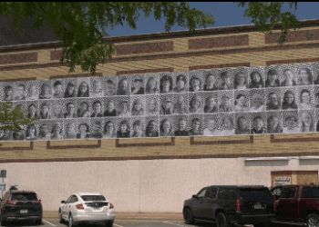 These 72 Large-scale black-and-white portraits line the rear facade of the Delft Theatre — everyday people who’ve worked, lived, and given back to the community, but whose contributions often go unrecognized.