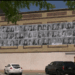 These 72 Large-scale black-and-white portraits line the rear facade of the Delft Theatre — everyday people who’ve worked, lived, and given back to the community, but whose contributions often go unrecognized.