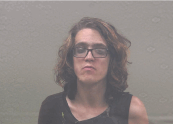 A Dickinson County man is behind bars tonight after allegedly trying to firebomb a political office over the weekend.