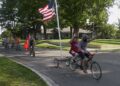 Co-founder Tom Nault leads the Patriotic Pedal Parade