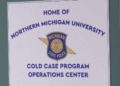 The students arriving for this class are, unlike other students, these juniors and seniors are actually working on cold case files for the Michigan State Police.