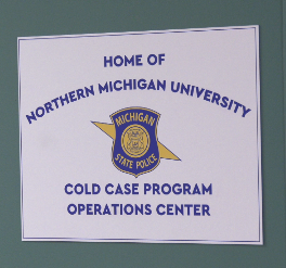 The students arriving for this class are, unlike other students, these juniors and seniors are actually working on cold case files for the Michigan State Police.