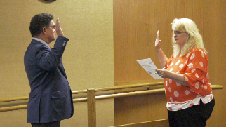 The Marquette County Board has a new budget and a new face.