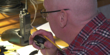 Far from the cheering fans and the amazing animal athletes sprinting down Washington Street is the quiet nerve center of the UP 200. Where all the logistics are handled.