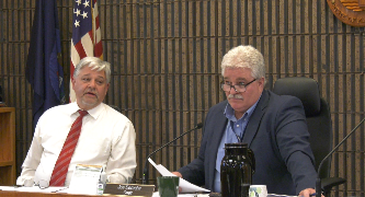 The Marquette County Board tonight entered into a three-year contract for medical examiner services with Dickinson County.