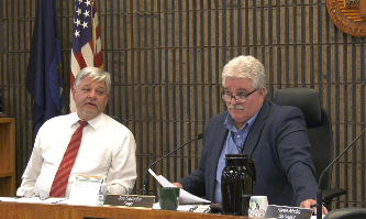 The Marquette County Board tonight entered into a three-year contract for medical examiner services with Dickinson County.