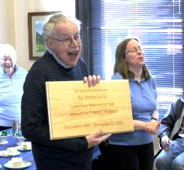 The friends of the Negaunee Public Library held a reception today in honor of Al Sundine, who served the Negaunee Library and its patrons for 45 years.