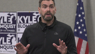 Kyle Blomquist is campaigning for Congress with a message he says is aimed at people who felt left behind by the current political and economic system.