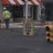 A team from the City of Escanaba Electric Department works to get the traffic signals up and running again.